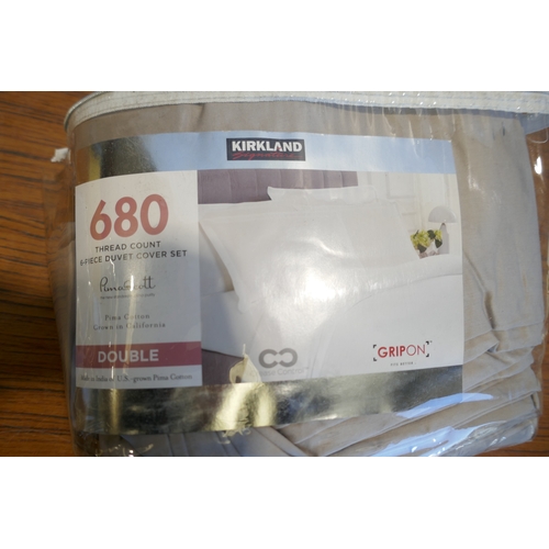 6036 - A Rem-Fit double waterproof fitted sheet and a quantity of Kirkland Signature double bedding, (384-3... 