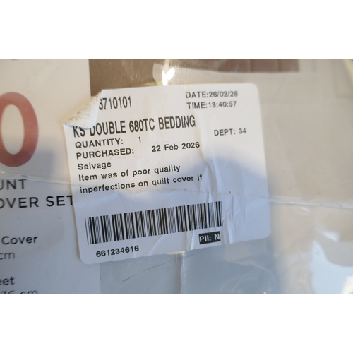 6036 - A Rem-Fit double waterproof fitted sheet and a quantity of Kirkland Signature double bedding, (384-3... 