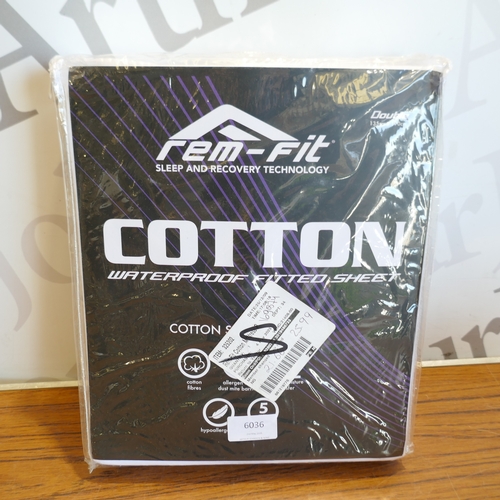 6036 - A Rem-Fit double waterproof fitted sheet and a quantity of Kirkland Signature double bedding, (384-3... 