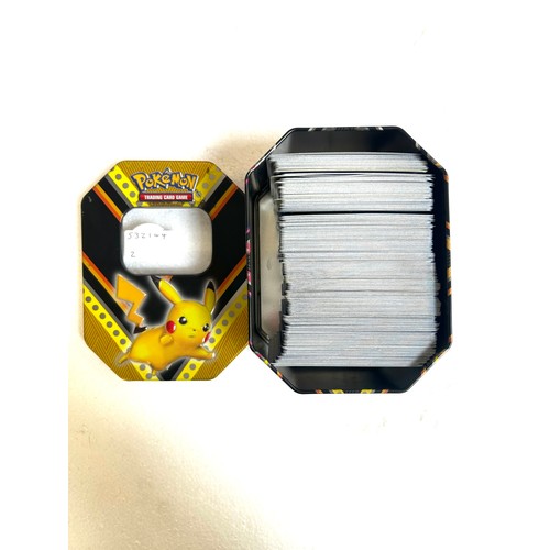 5006B - 3 Pokémon tins containing approximately 1100 Pokémon cards from various sets including Ascended Hero... 