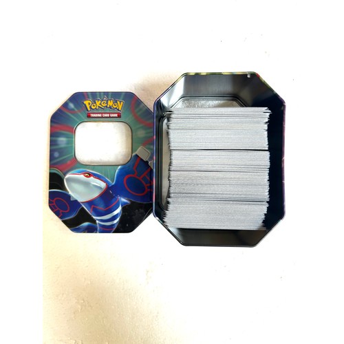 5006B - 3 Pokémon tins containing approximately 1100 Pokémon cards from various sets including Ascended Hero... 