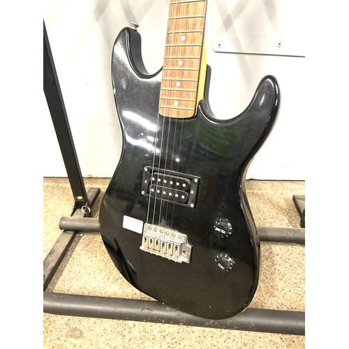 5023A - An Encore 3/4 size black electric guitar