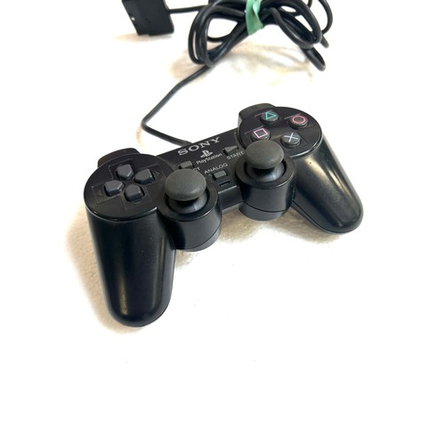 5024A - A PlayStation 2 Slim games console with a Sony Dualshock 2 controller, power supply, AV cables and f... 