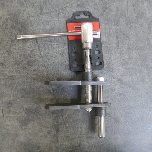 5038 - A precision steel 80mm steel brake caliper piston retractor tool, a Clarke ball joint separator kit ... 