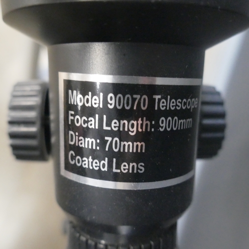 5051 - A model 90070, 900 x 70mm telescope with tripod stand and assorted accessories