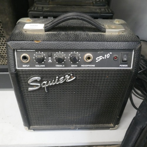 5020 - A quantity of musical items including a Fender Squire electric guitar with case, a Jose Ferrer El Pr... 