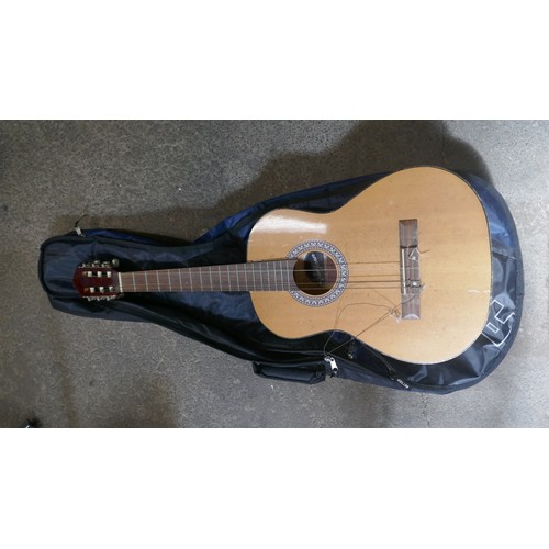 5020 - A quantity of musical items including a Fender Squire electric guitar with case, a Jose Ferrer El Pr... 