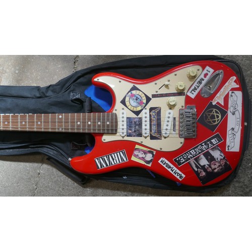5020 - A quantity of musical items including a Fender Squire electric guitar with case, a Jose Ferrer El Pr... 