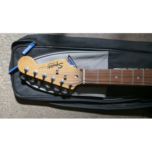 5020 - A quantity of musical items including a Fender Squire electric guitar with case, a Jose Ferrer El Pr... 