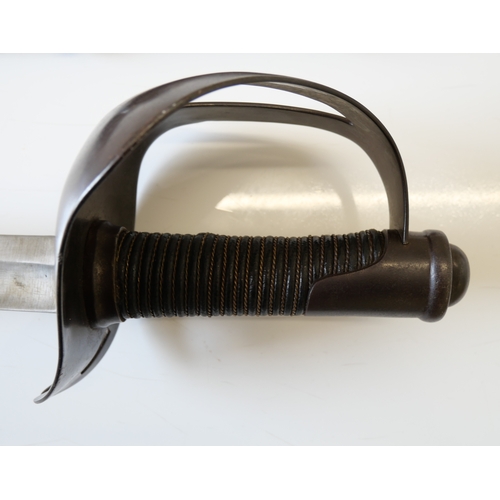 2020 - A Italian M1860 cavalry sword and scabbard. Blade stamped with S&K maker’s mark (Schnitzler & Kirsch... 