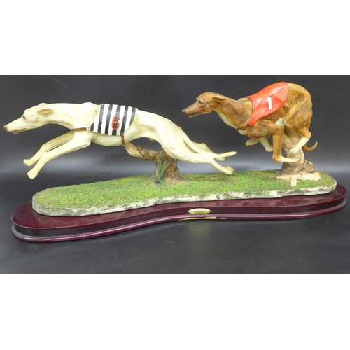 2038 - A Juliana Collection greyhound racing figure in resin on a wooden base, base 48cm