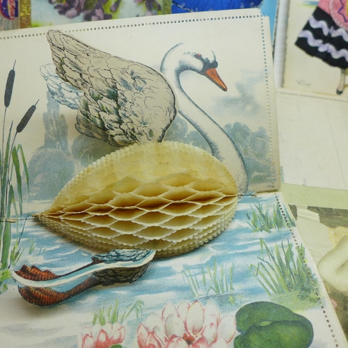2055 - A collection of vintage postcards, including 'The Real Fan' mechanical postcard, four other mechanic... 