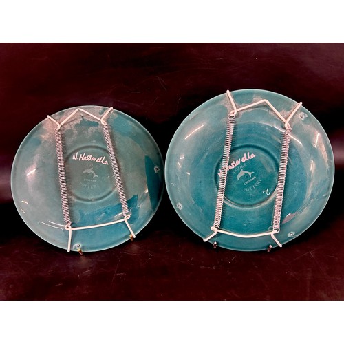 2039A - Two Nicola Massarella for Poole Pottery plates, with blue glazed design, signed by artist to verso, ... 