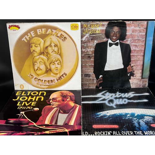 2245 - A collection of records including Queen, Diana Ross, Elvis Presley, etc.