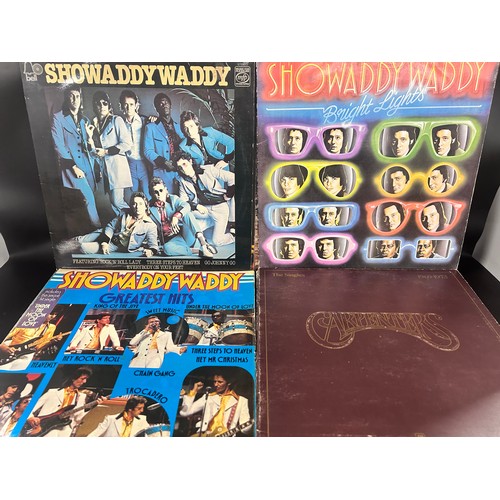 2245 - A collection of records including Queen, Diana Ross, Elvis Presley, etc.