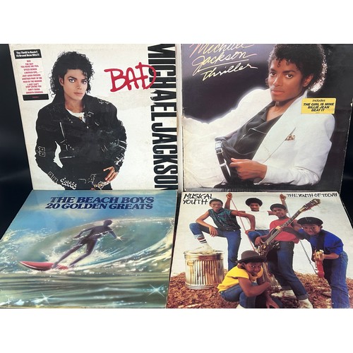 2245 - A collection of records including Queen, Diana Ross, Elvis Presley, etc.
