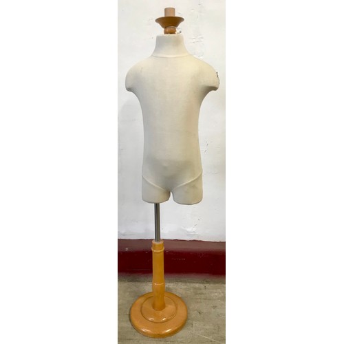A shop display half mannequin