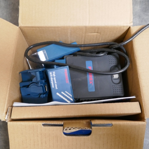 A box of assorted tools including Ferrex 850w reciprocating saw, Ferrex ...