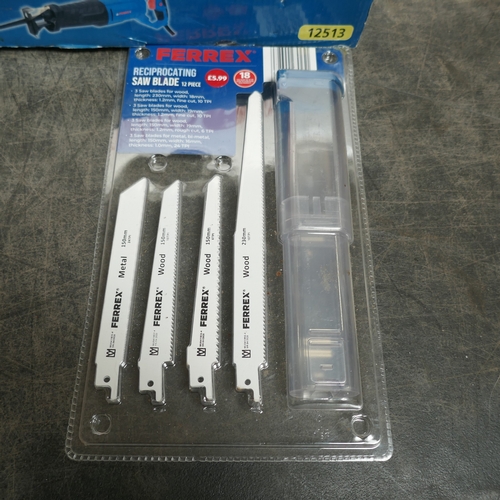 A box of assorted tools including Ferrex 850w reciprocating saw, Ferrex ...
