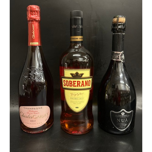2242 - Three bottles of alcohol comprising of Champagne, Nua Prosecco and Soberano