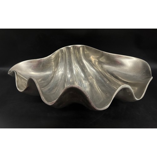 2252 - A stainless steel ice bucket / centrepiece in the form of a shell, 46cm wide