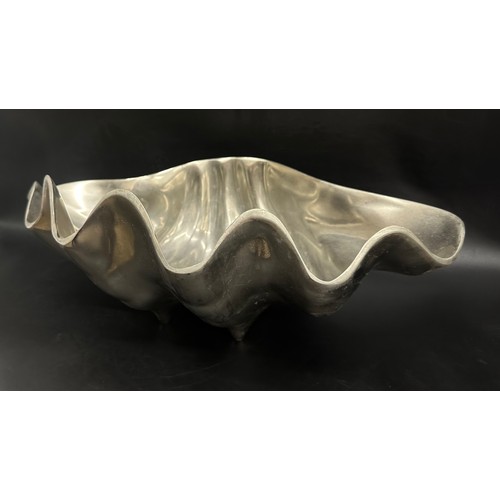 2252 - A stainless steel ice bucket / centrepiece in the form of a shell, 46cm wide