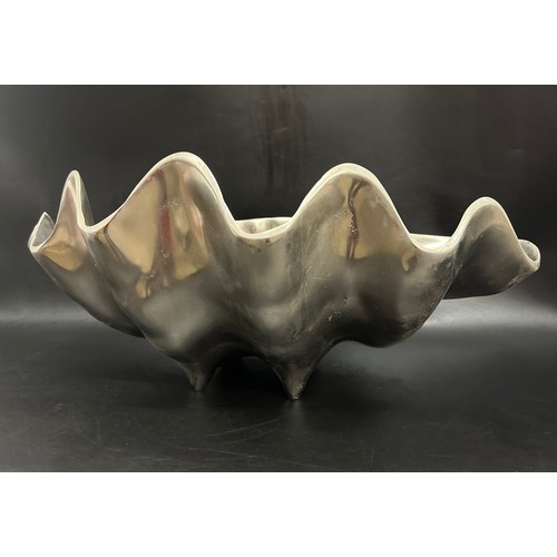 2252 - A stainless steel ice bucket / centrepiece in the form of a shell, 46cm wide