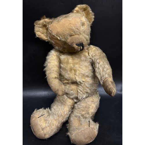 2260 - A vintage Merrythought teddy bear, missing eyes, Merrythought label sewed to foot