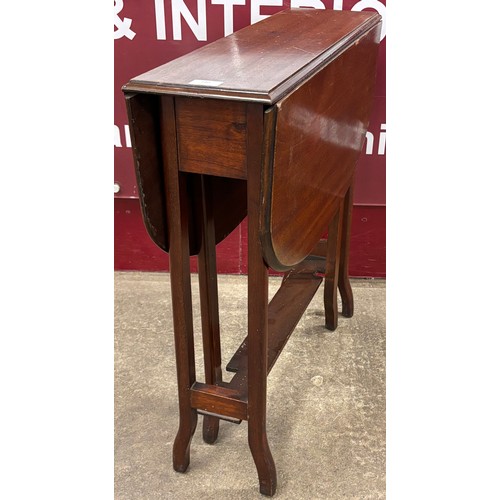 140 - An Edward VII mahogany Sutherland table