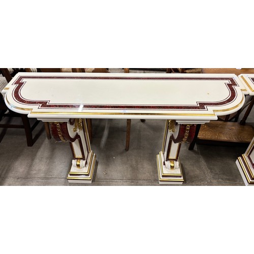 157 - A pair of Italian style faux marble console tables
