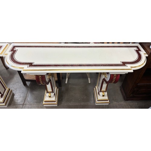 157 - A pair of Italian style faux marble console tables