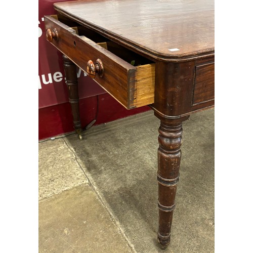 144 - A William IV mahogany two drawer serving table
