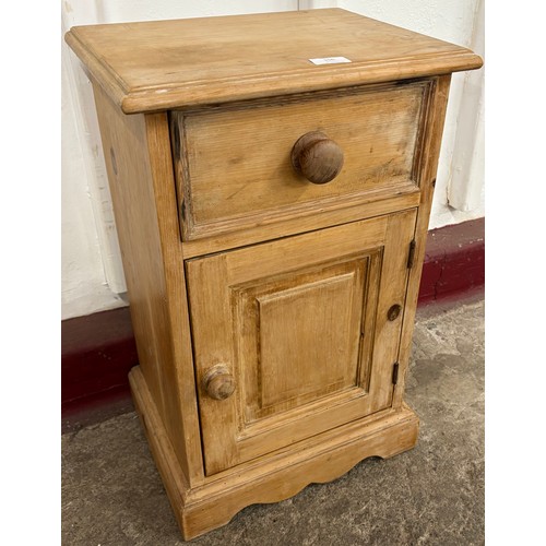 156 - A Victorian style pine bedside cabinet