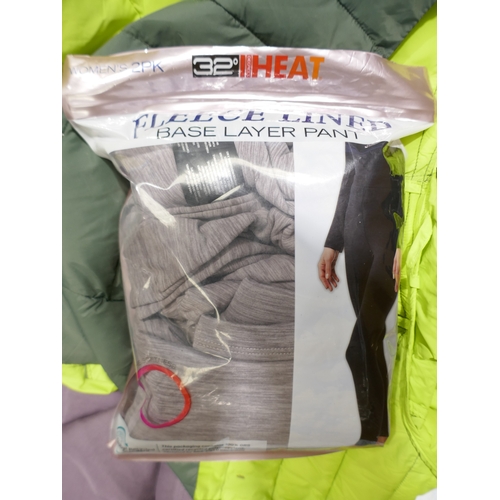 6136 - A pallet of mixed clothing to include trousers, shirts, underwear, coats, etc. various brands and si... 