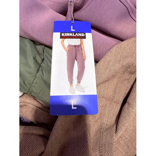 6136 - A pallet of mixed clothing to include trousers, shirts, underwear, coats, etc. various brands and si... 