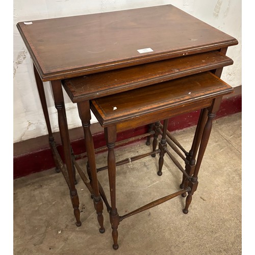 166 - An Edward VII inlaid mahogany nest of tables