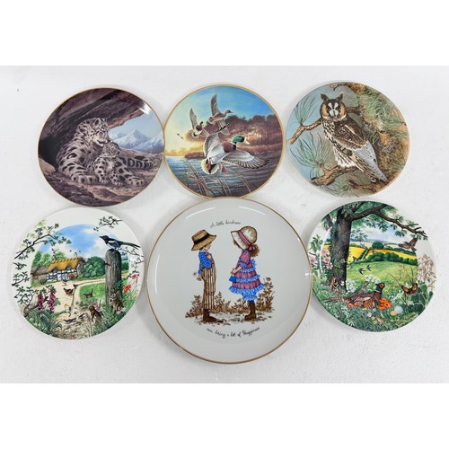 2283 - A large collection of cabinet display plates including The Bradford Exchange (3 boxes in total) *Not... 