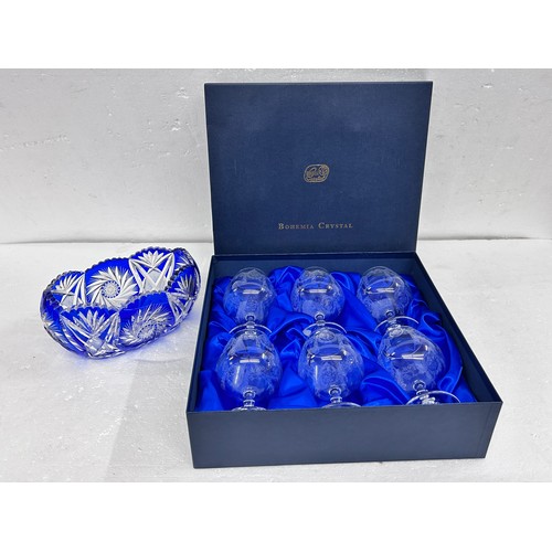 2292 - A boxed set of six Bohemia Crystal Czech brandy glasses with etched design and a cut glass blue Bohe... 