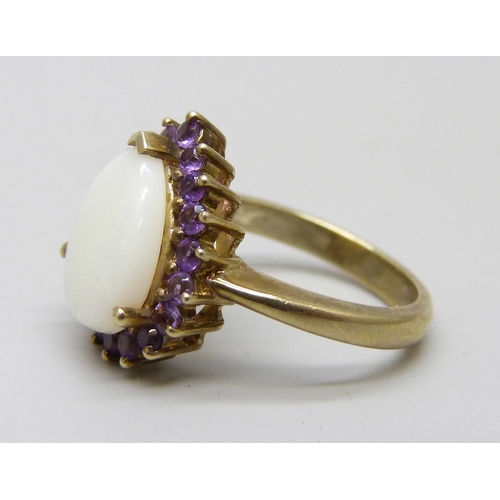7035 - A silver gilt opal amethyst ring, M