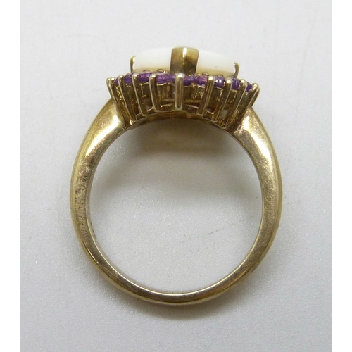 7035 - A silver gilt opal amethyst ring, M