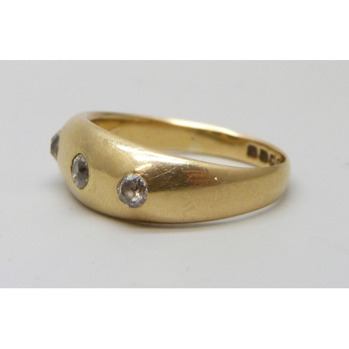 7036 - An Edwardian 18ct gold gypsy three stone old cut diamond ring, chips to stones, London, 1910, 5.5g, ... 