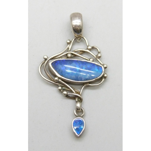 7046 - An Arts & Crafts silver and opal pendant, 4.5cm including bail