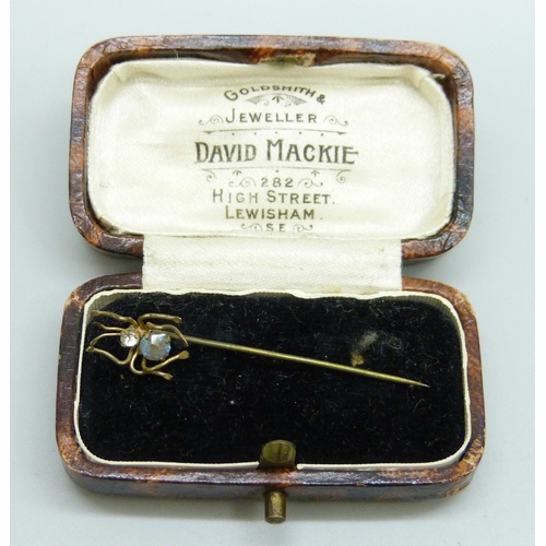 7054 - A Czech saphiret set spider stick pin, 4.2cm
