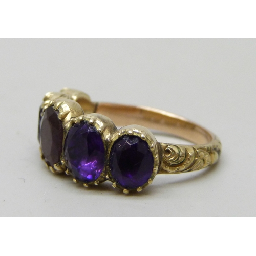 A Georgian yellow metal five stone ring, the outer stones test as ...