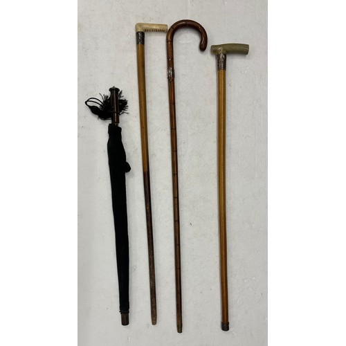 2273 - Three silver top walking sticks and umbrella