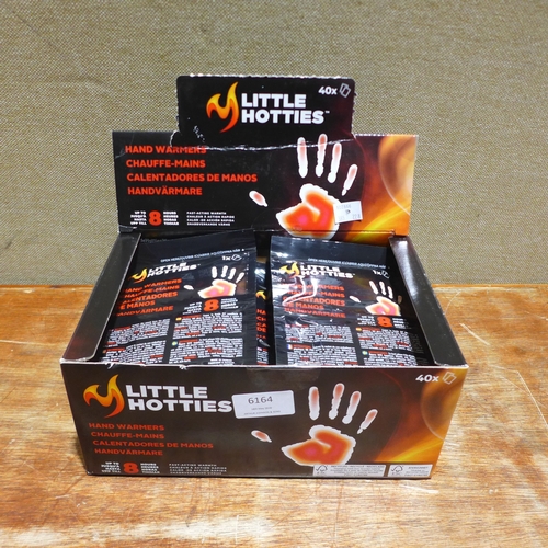 6164 - A set of Hotties hand warmers  (385-228) *This lot is subject to VAT