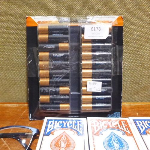 6178 - A quantity of playing cards, three pairs of FGX reading glasses and quantity of Duracell batteries (... 