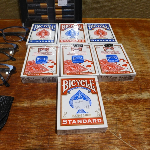 6178 - A quantity of playing cards, three pairs of FGX reading glasses and quantity of Duracell batteries (... 