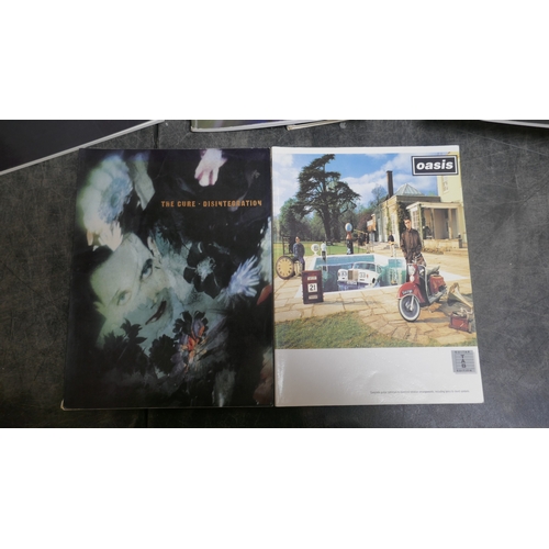 5019 - A large quantity of guitar books and a guitar bag
