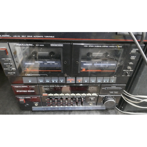 5041 - A quantity of Realistic stereo equipment including an ST-2000L tuner amp, an SCT-2000 high speed dub... 